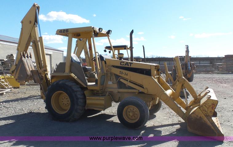 image for item J7606 Caterpillar 426 backhoe