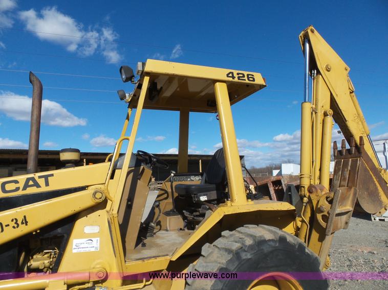 image for item J7606 Caterpillar 426 backhoe