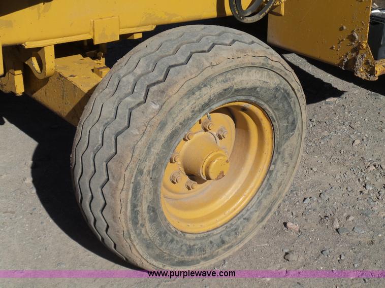 image for item J7606 Caterpillar 426 backhoe