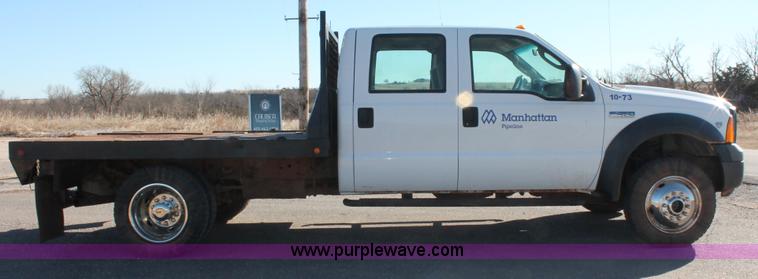 image for item L6799 2006 Ford F450 Super Duty Crew Cab flatbed truck