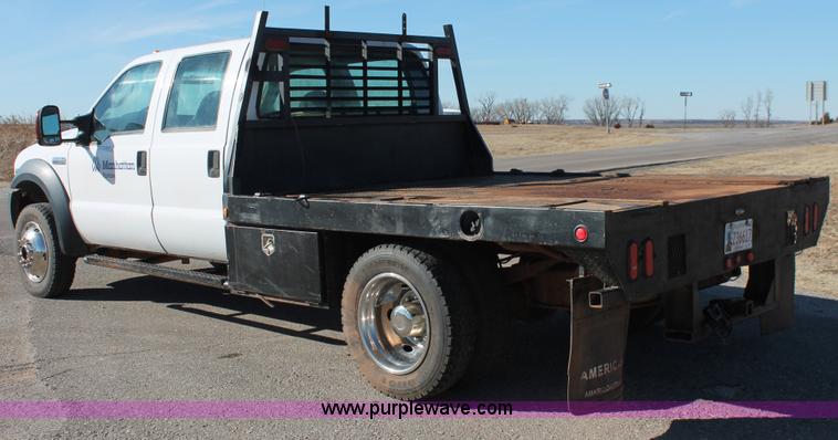 image for item L6799 2006 Ford F450 Super Duty Crew Cab flatbed truck