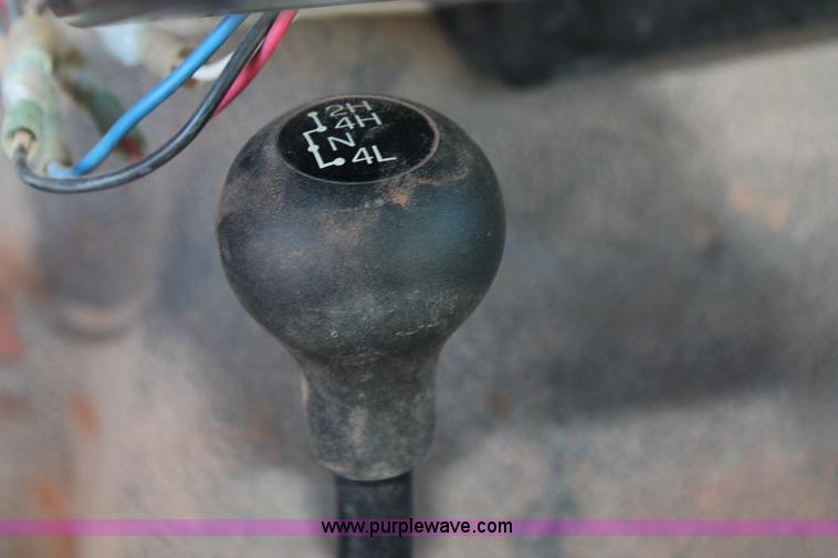 image for item L6799 2006 Ford F450 Super Duty Crew Cab flatbed truck