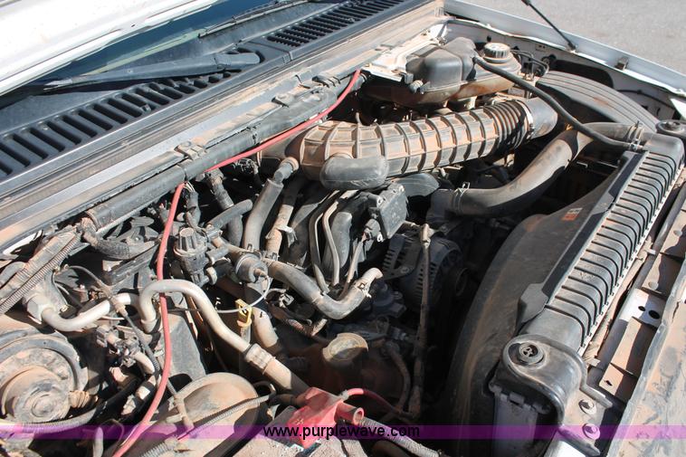 image for item L6799 2006 Ford F450 Super Duty Crew Cab flatbed truck