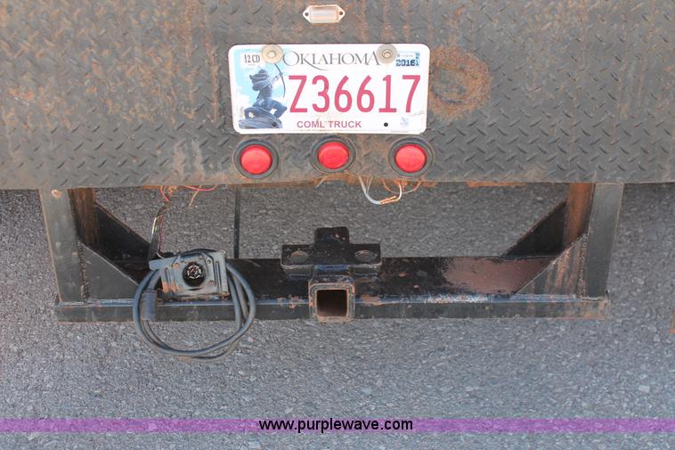 image for item L6799 2006 Ford F450 Super Duty Crew Cab flatbed truck