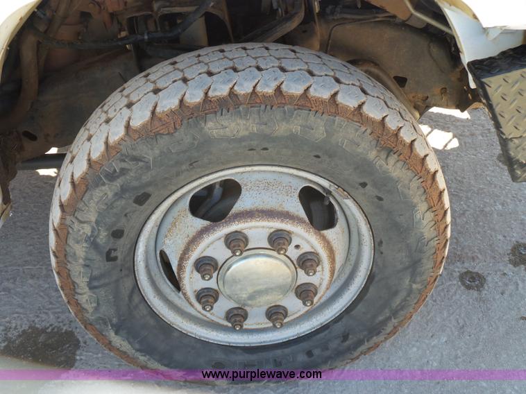 image for item L6812 2011 Chevrolet Silverado 3500HD Crew Cab flatbed pickup truck