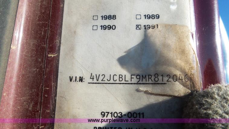 image for item K4505 1991 Volvo WG cable rolloff truck