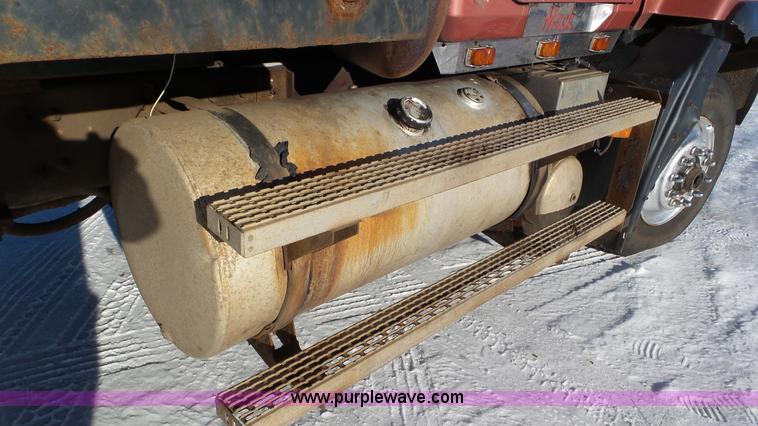 image for item K4506 1999 Mack CL713 grapple truck