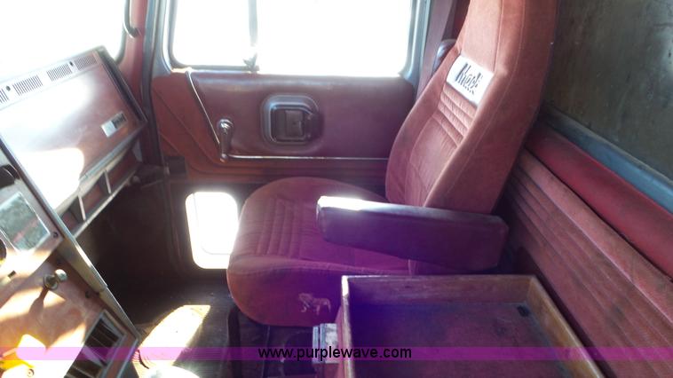 image for item K4506 1999 Mack CL713 grapple truck