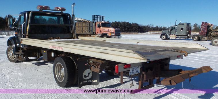 image for item K4507 1997 International 4700 rollback truck