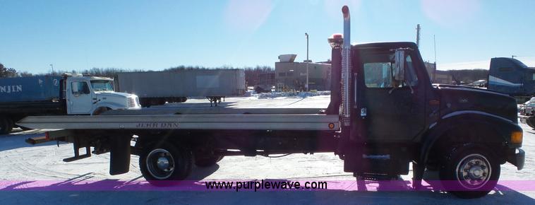 image for item K4507 1997 International 4700 rollback truck