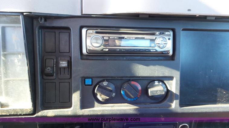 image for item K4507 1997 International 4700 rollback truck