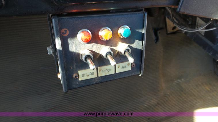 image for item K4507 1997 International 4700 rollback truck