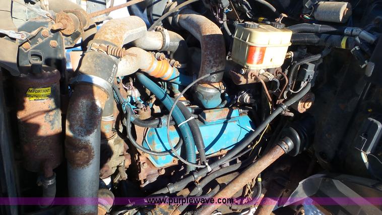 image for item K4507 1997 International 4700 rollback truck