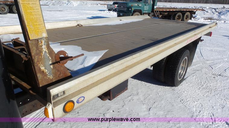 image for item K4507 1997 International 4700 rollback truck