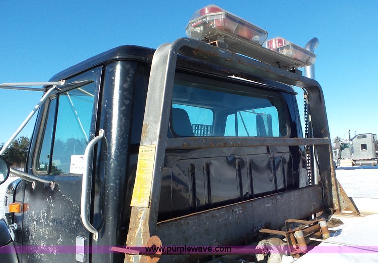 image for item K4507 1997 International 4700 rollback truck