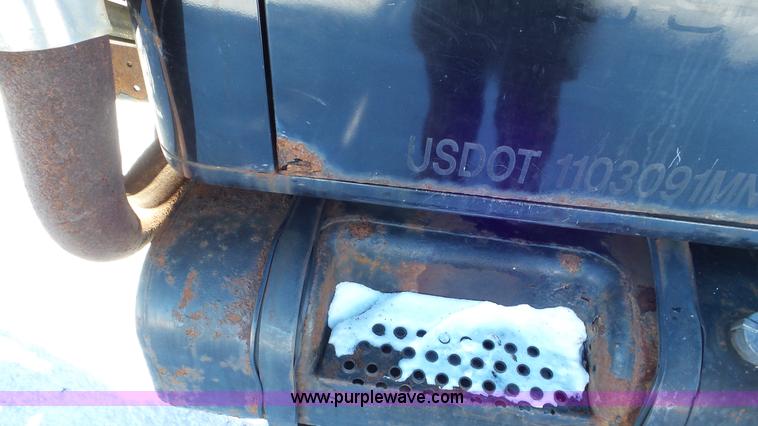 image for item K4507 1997 International 4700 rollback truck