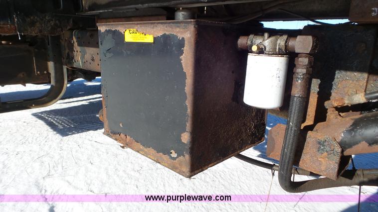 image for item K4507 1997 International 4700 rollback truck