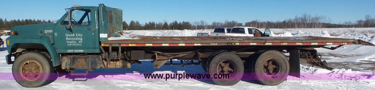 image for item K4508 1987 Ford FT900 rollback truck