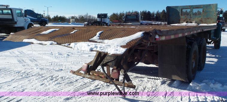 image for item K4508 1987 Ford FT900 rollback truck