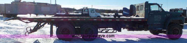 image for item K4508 1987 Ford FT900 rollback truck