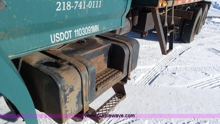 image for item K4508 1987 Ford FT900 rollback truck