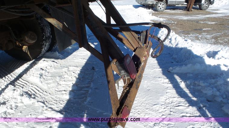 image for item K4508 1987 Ford FT900 rollback truck