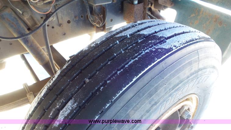 image for item K4508 1987 Ford FT900 rollback truck