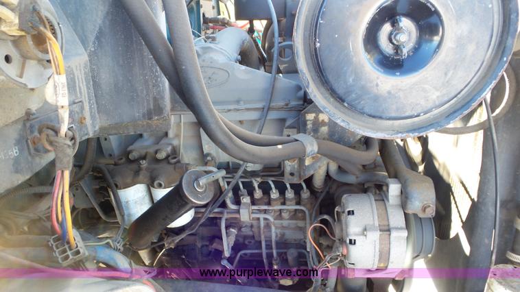 image for item K4508 1987 Ford FT900 rollback truck