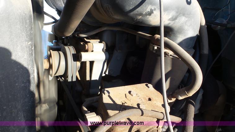 image for item K4508 1987 Ford FT900 rollback truck