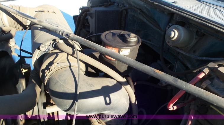 image for item K4508 1987 Ford FT900 rollback truck