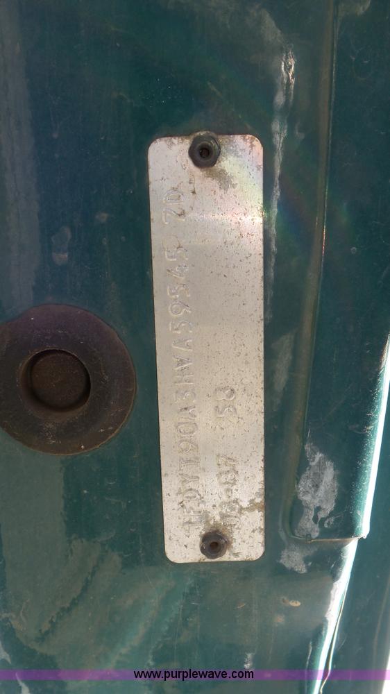 image for item K4508 1987 Ford FT900 rollback truck