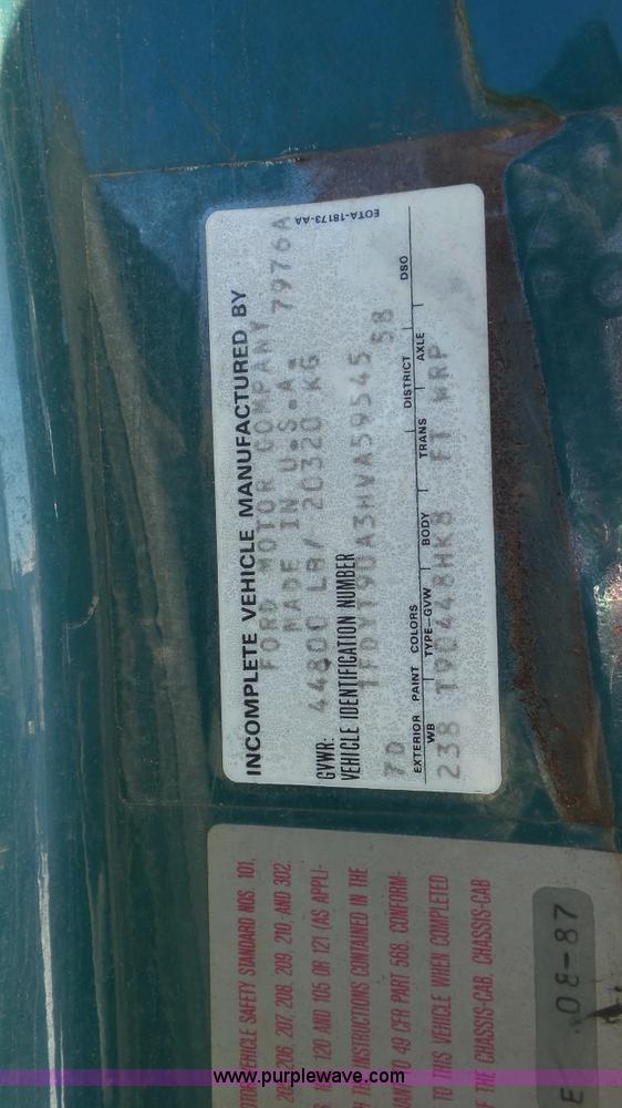 image for item K4508 1987 Ford FT900 rollback truck