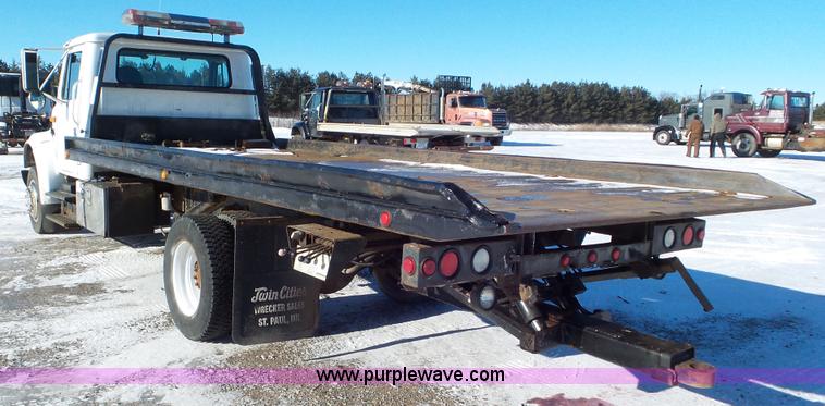 image for item K4509 2001 International 4700 rollback truck