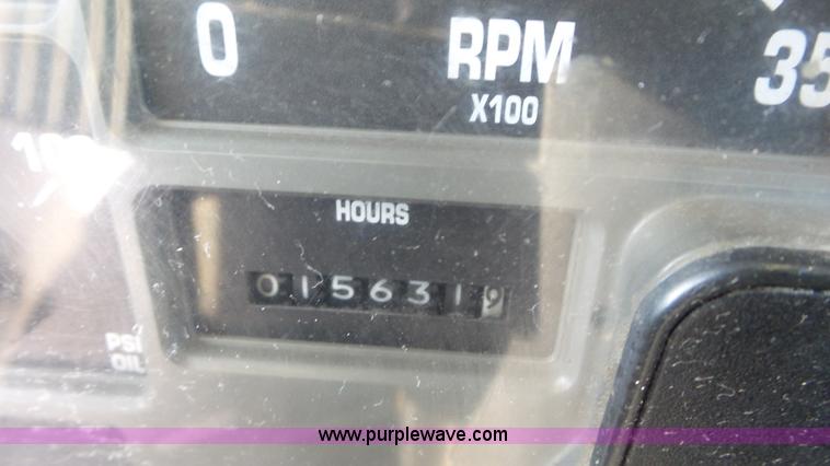 image for item K4509 2001 International 4700 rollback truck