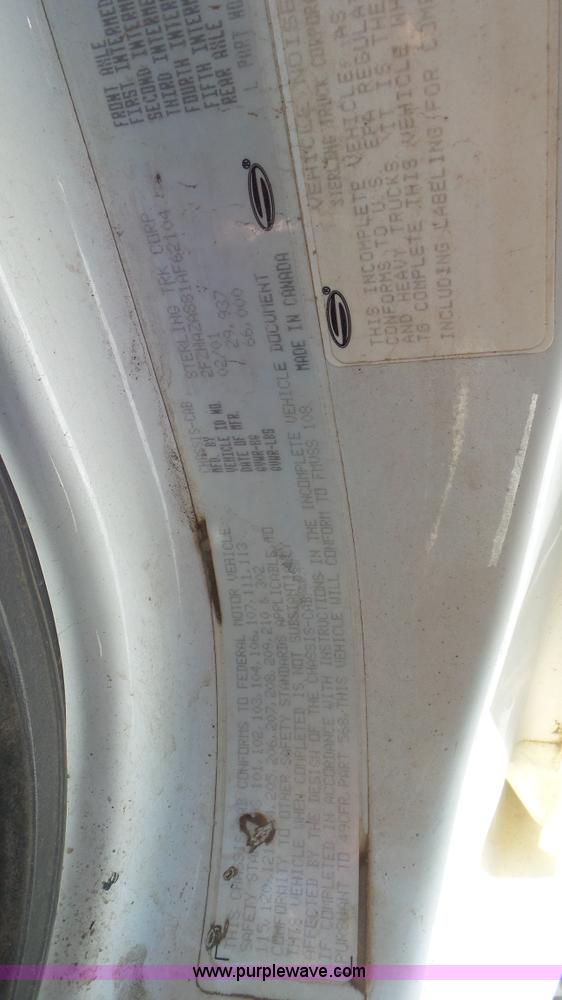 image for item K4510 2001 Sterling L9500 hook lift truck