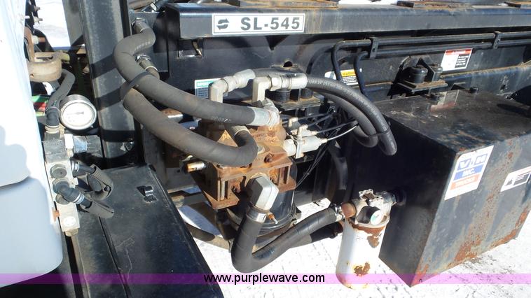 image for item K4510 2001 Sterling L9500 hook lift truck