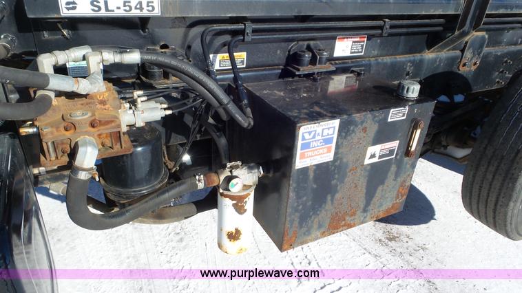 image for item K4510 2001 Sterling L9500 hook lift truck