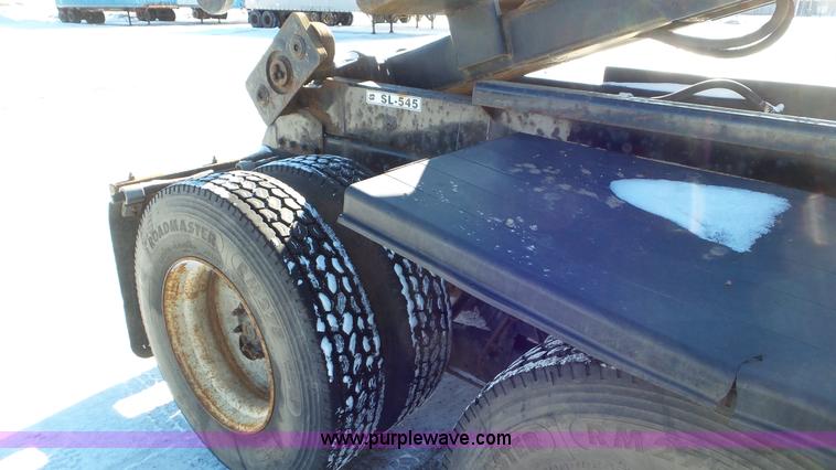 image for item K4510 2001 Sterling L9500 hook lift truck