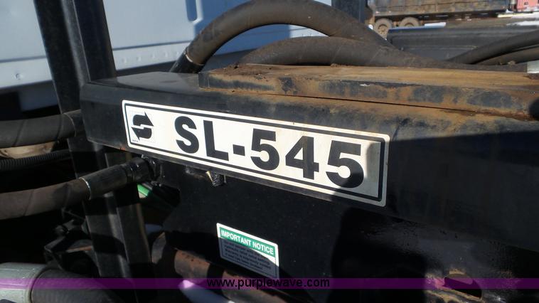 image for item K4510 2001 Sterling L9500 hook lift truck