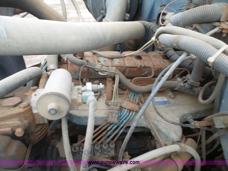 image for item K4570 1993 International 4900 hook bed truck