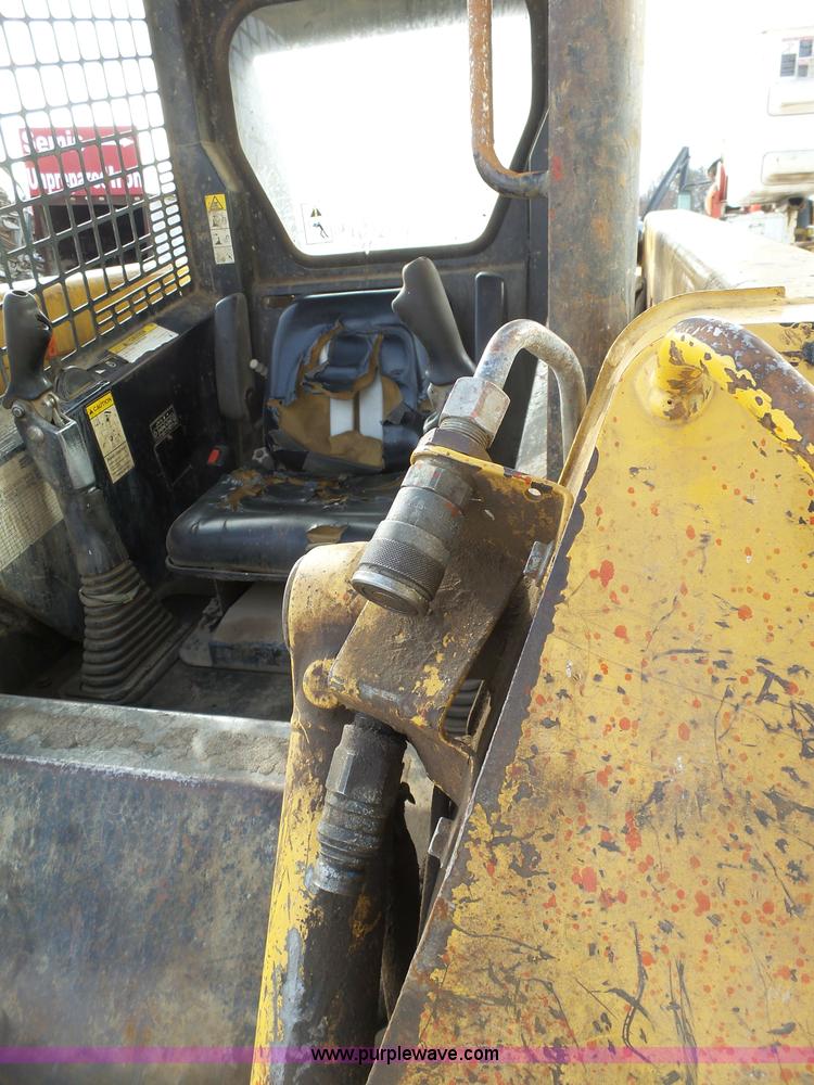 image for item K4573 1999 John Deere 240 skid steer