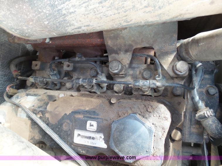 image for item K4573 1999 John Deere 240 skid steer