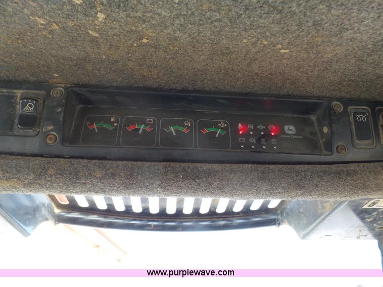 image for item K4573 1999 John Deere 240 skid steer