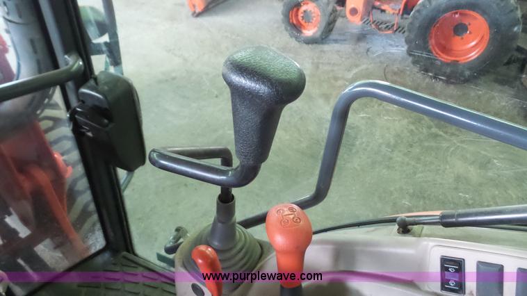 image for item J4689 2010 Kubota M7040D MFWD tractor