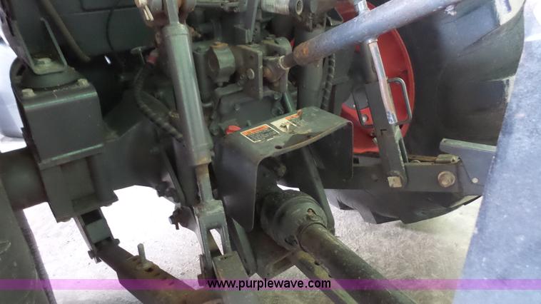 image for item J4689 2010 Kubota M7040D MFWD tractor