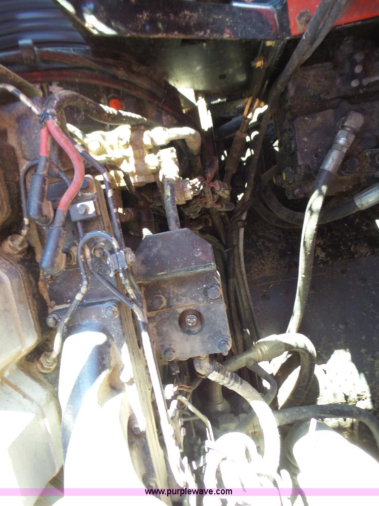 image for item J7674 2003 Massey-Ferguson 9790 RWA combine