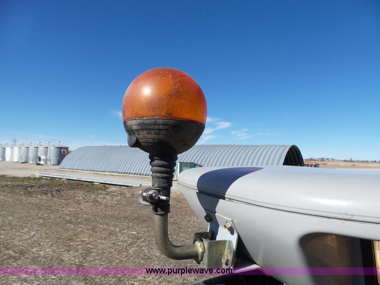 image for item J7674 2003 Massey-Ferguson 9790 RWA combine