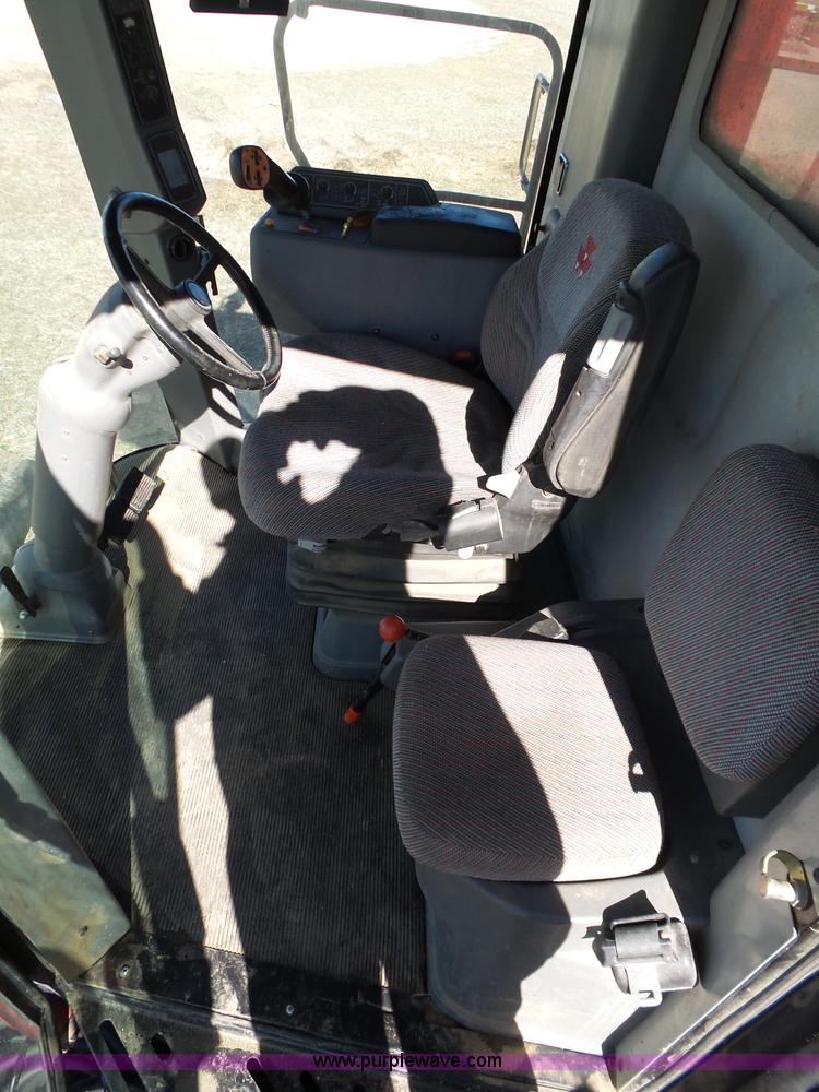 image for item J7674 2003 Massey-Ferguson 9790 RWA combine