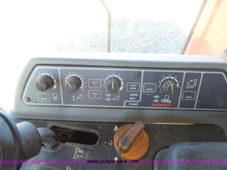 image for item J7674 2003 Massey-Ferguson 9790 RWA combine