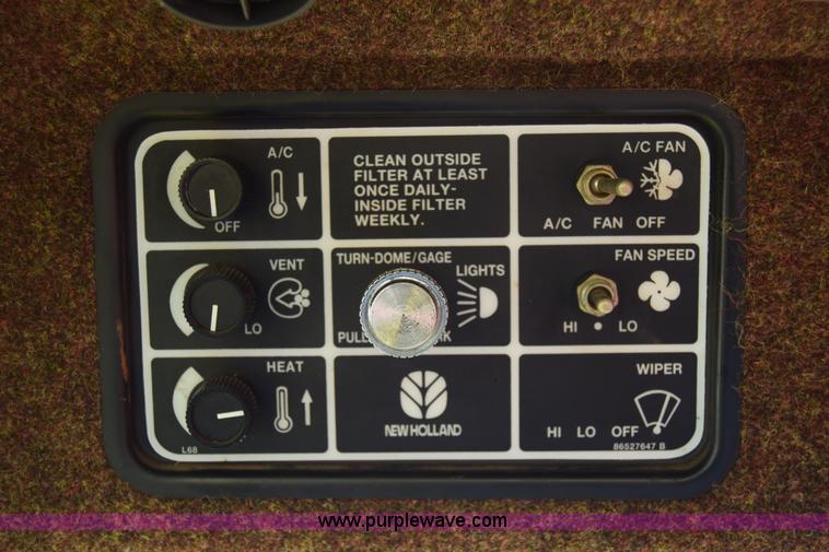 image for item K8668 1996 New Holland 2450 self-propelled windrower